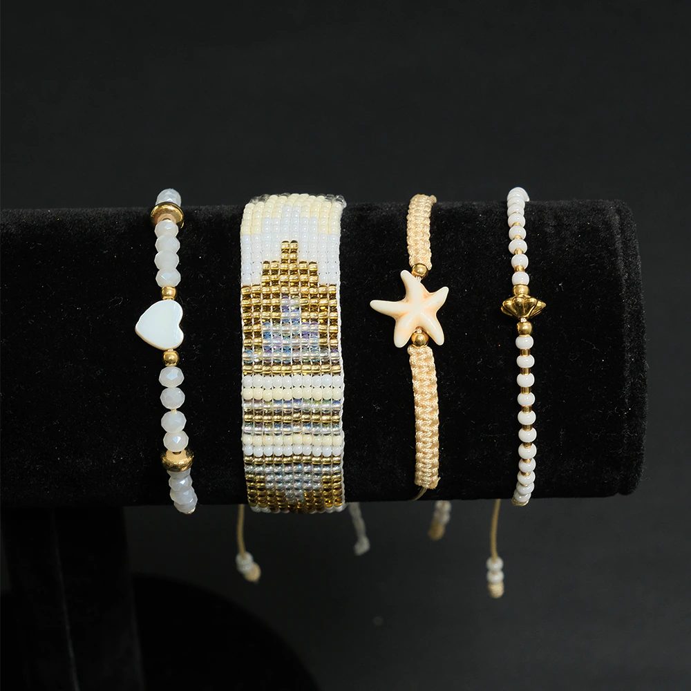 Juego Ivory Coast Charm de Pulseras Multicapas con Estrella y Corazon E2-10
