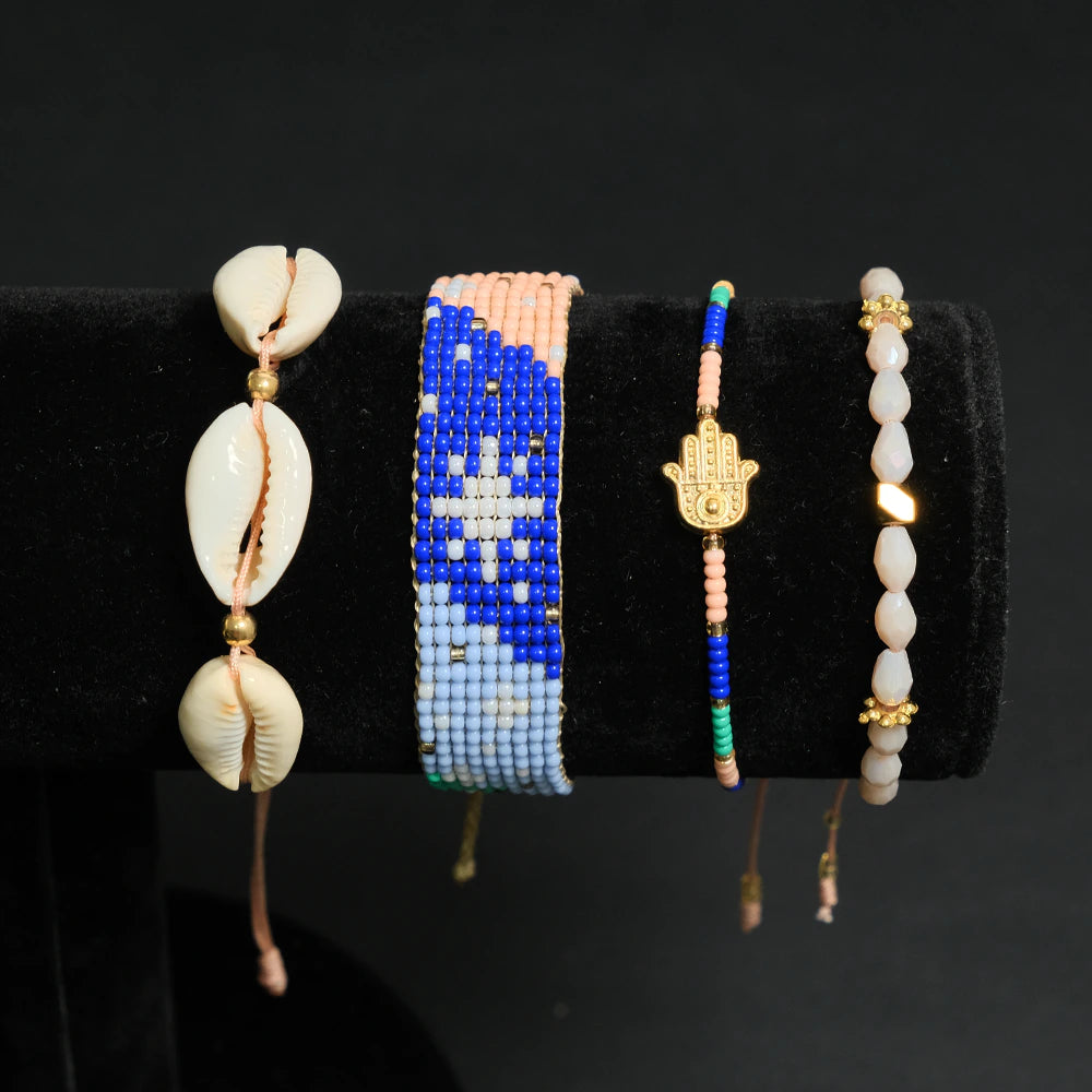 Juego Ocean Hamsa de Pulseras Multicapas con Conchas y Mano Fatima E2-11