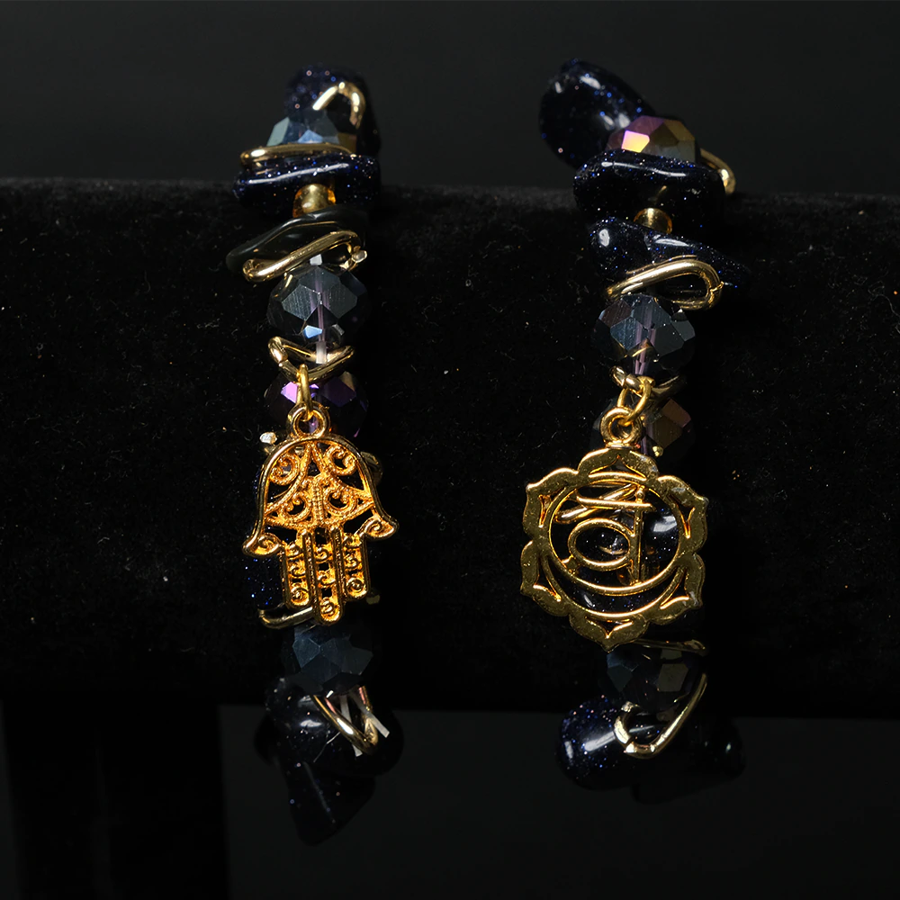 Pulsera Midnight Mystic con Cristales Oscuros y Dijes Dorados E3-08