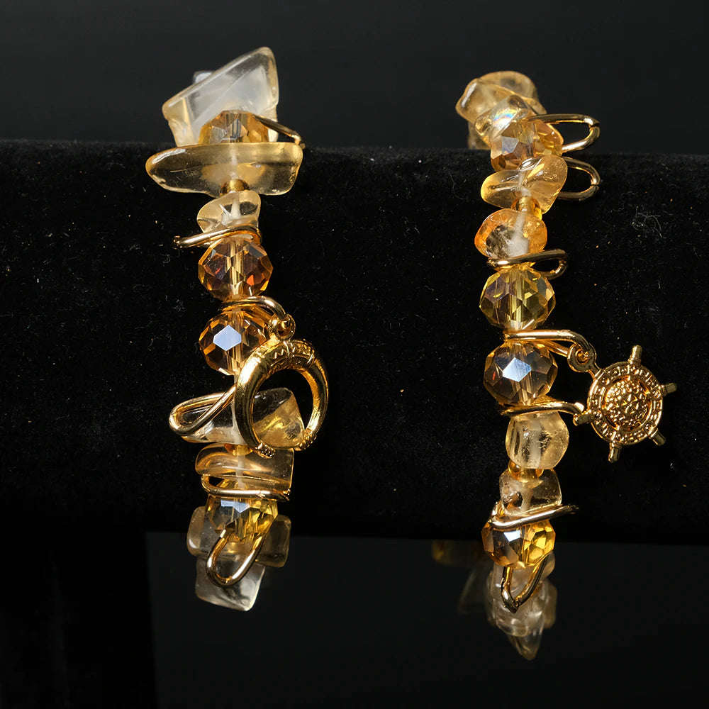 Pulsera Golden Eclipse con Cristales Dorados y Dijes Nauticos 3E-13